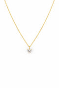 Gold necklace with a small heart pendant pave crystal