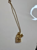 Flower and lock gold necklace