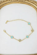 18 K gold bracelet with blue flower /gold pave crystals