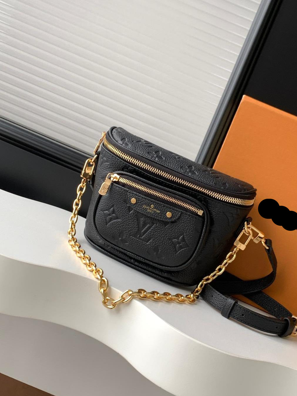 Black bumbag with gold chain/crossbody strap