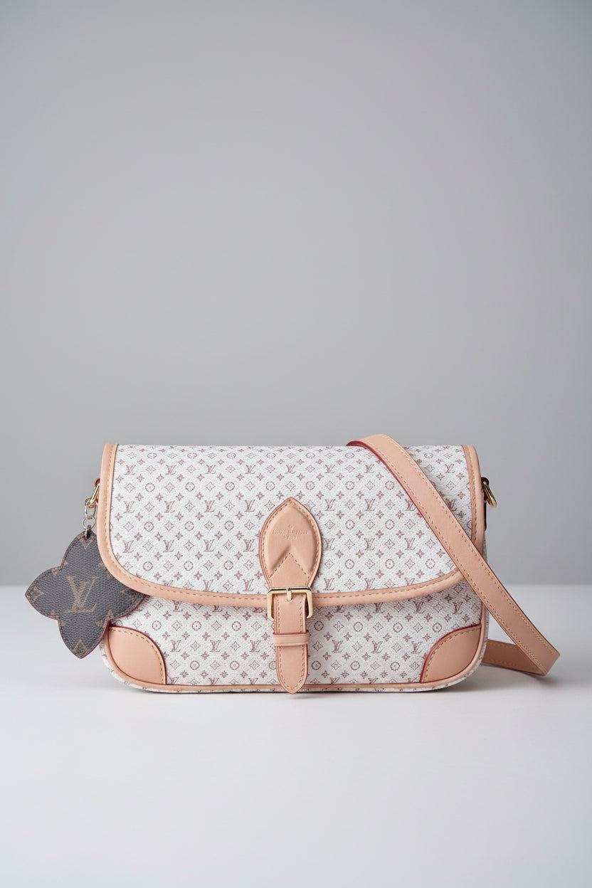 Designer handbag with patterned design 