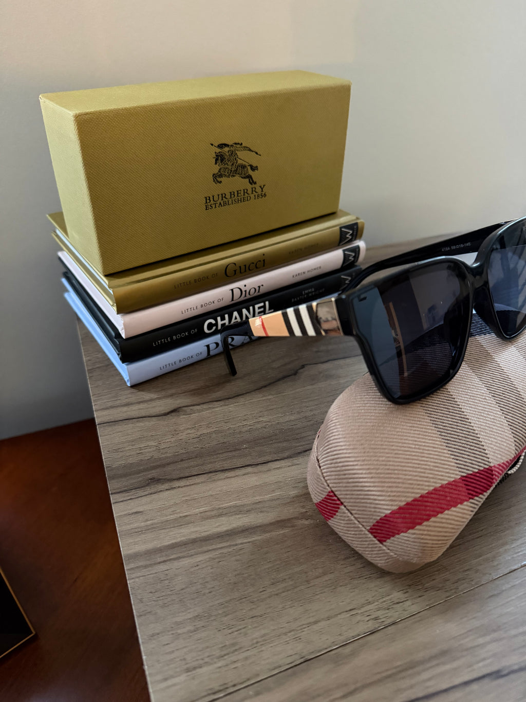 BB sunglasses with gold and stripe logo