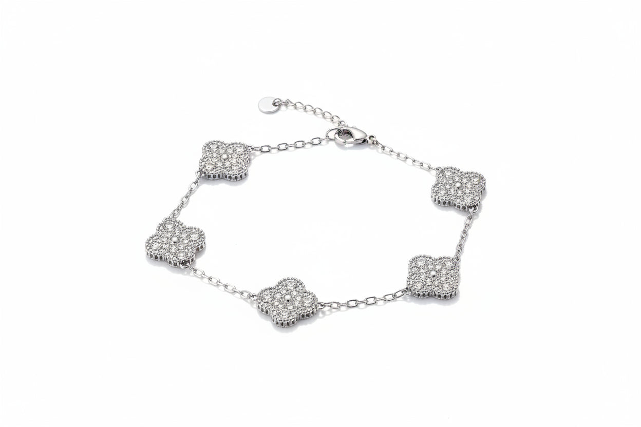Silver bracelet with clover-shaped charms vc stones