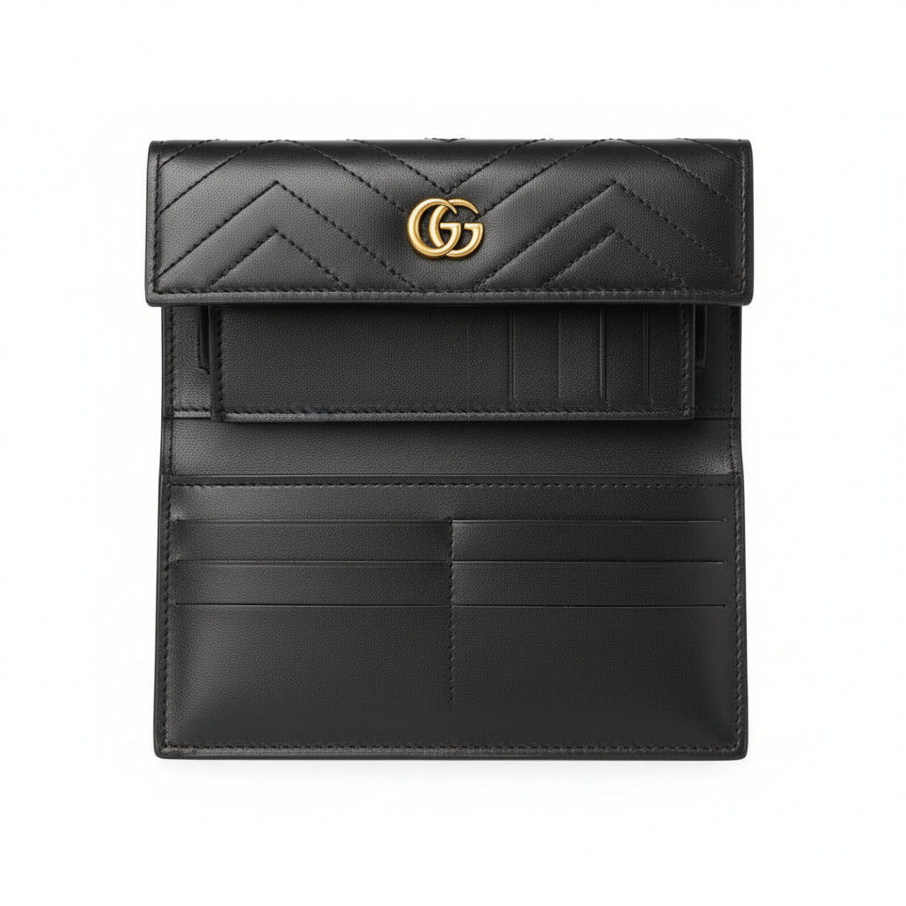 Black quilted wallet with gold logo