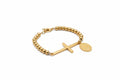 Gold filled bracelet with a cross and medallion 