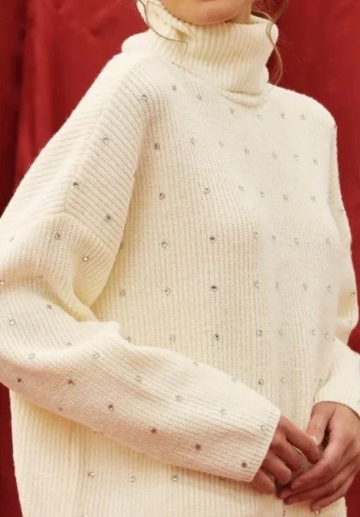 Cream-colored sweater with gem embellishments 